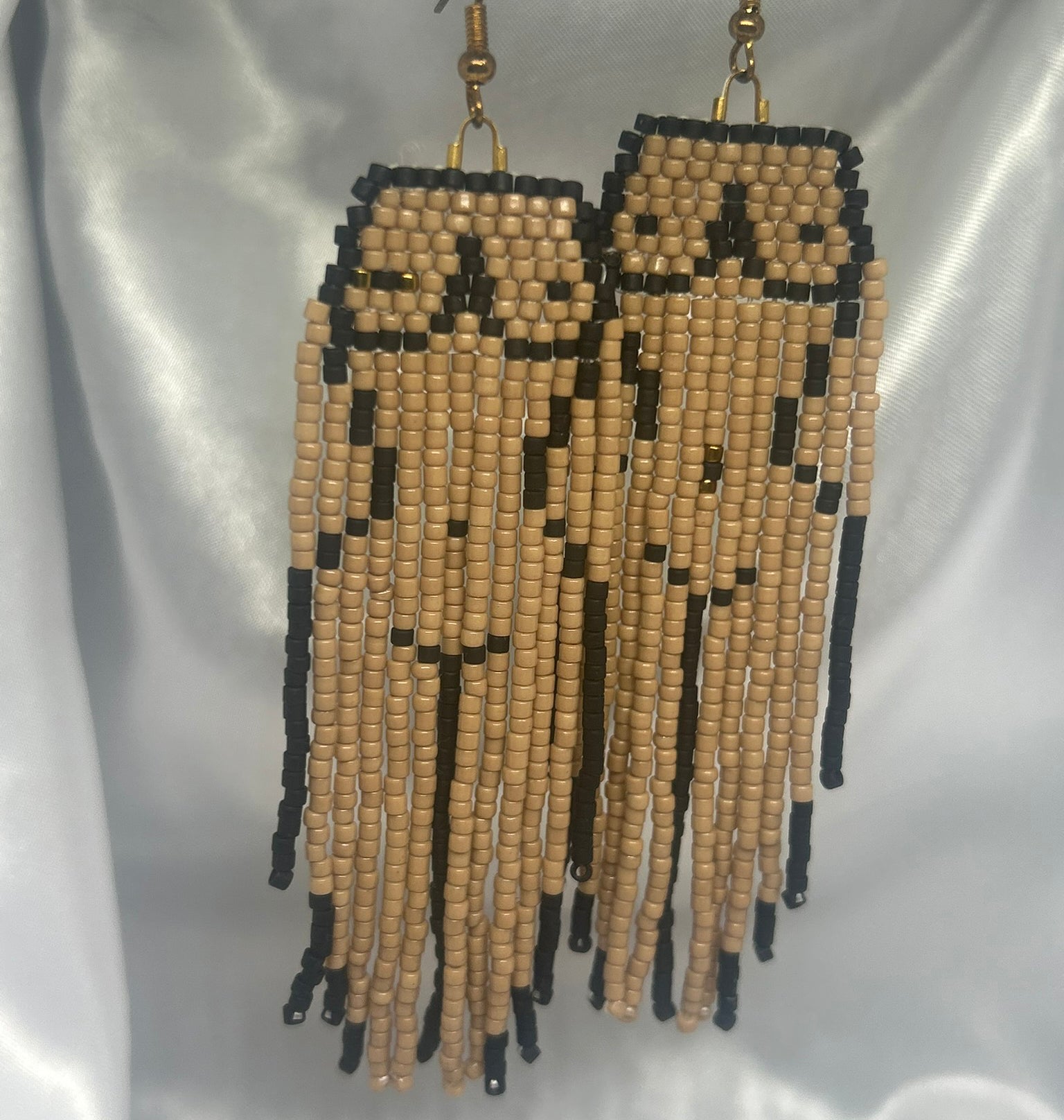 ''Bronze Island Body'' earrings